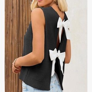 Black Sleeveless Top with White Bow Accents